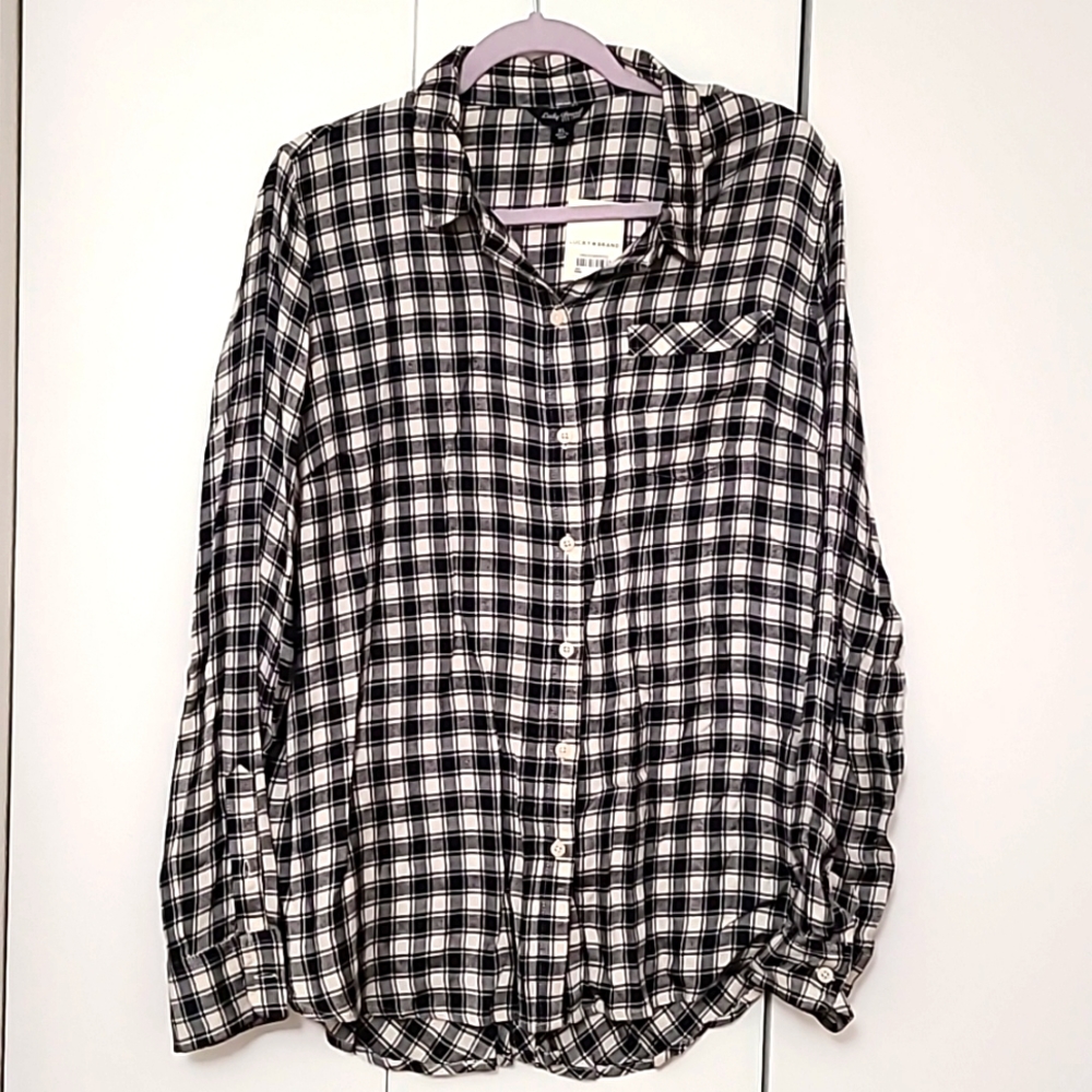 Lucky top with unique detail on back. NWT